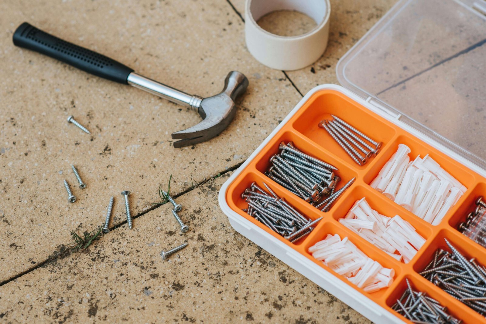 Outdoor gear maintenance workspace with basic tools scaled